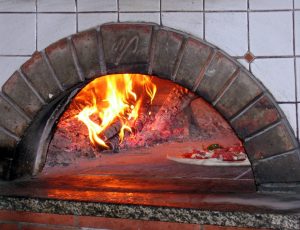 cuocere pizza